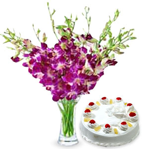 10 Purple Orchids in Vase & 1 kg Cake (of your choice)